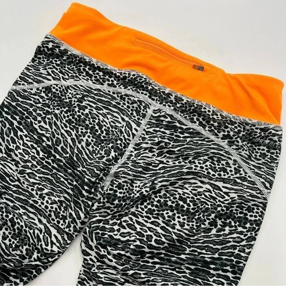 NIKE Women’s M Racer Leopard Print Running‎ Crop Leggings zipper pocket Dri-fit